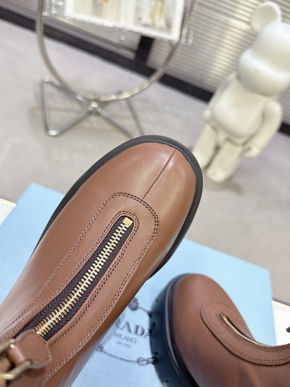 PRADA 25S ZIP-UP ANKLE BOOTS IN BROWN CALFSKIN