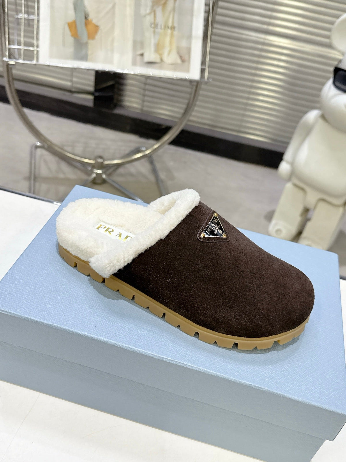 PRADA 25S FUR-LINED MULES IN RK BROWN SUEDE