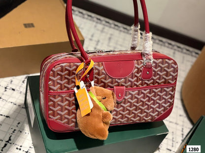 GOYARD SAINT MARTIN BAG 35 IN BURGUNDY RED GOYARDINE CANVAS AND CALFSKIN