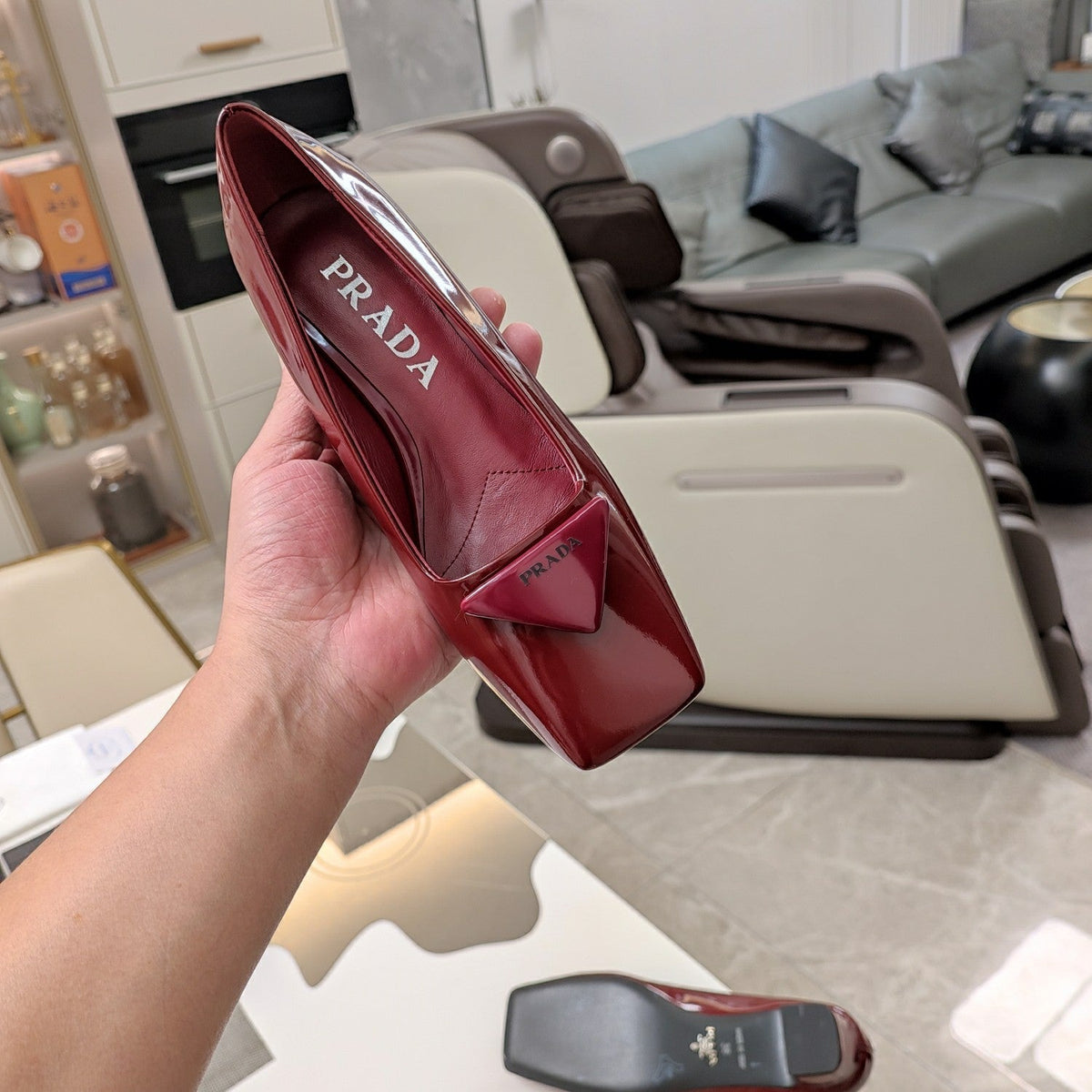 PRADA TRIANGLE LOGO PUMPS IN CURRANT RED GLOSSY CALFSKIN