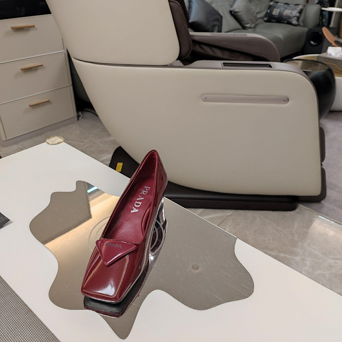 PRADA TRIANGLE LOGO PUMPS IN CURRANT RED GLOSSY CALFSKIN
