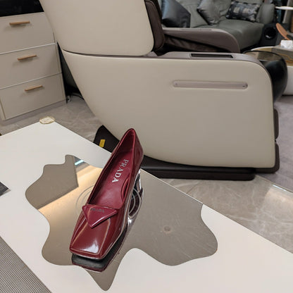 PRADA TRIANGLE LOGO PUMPS IN CURRANT RED GLOSSY CALFSKIN