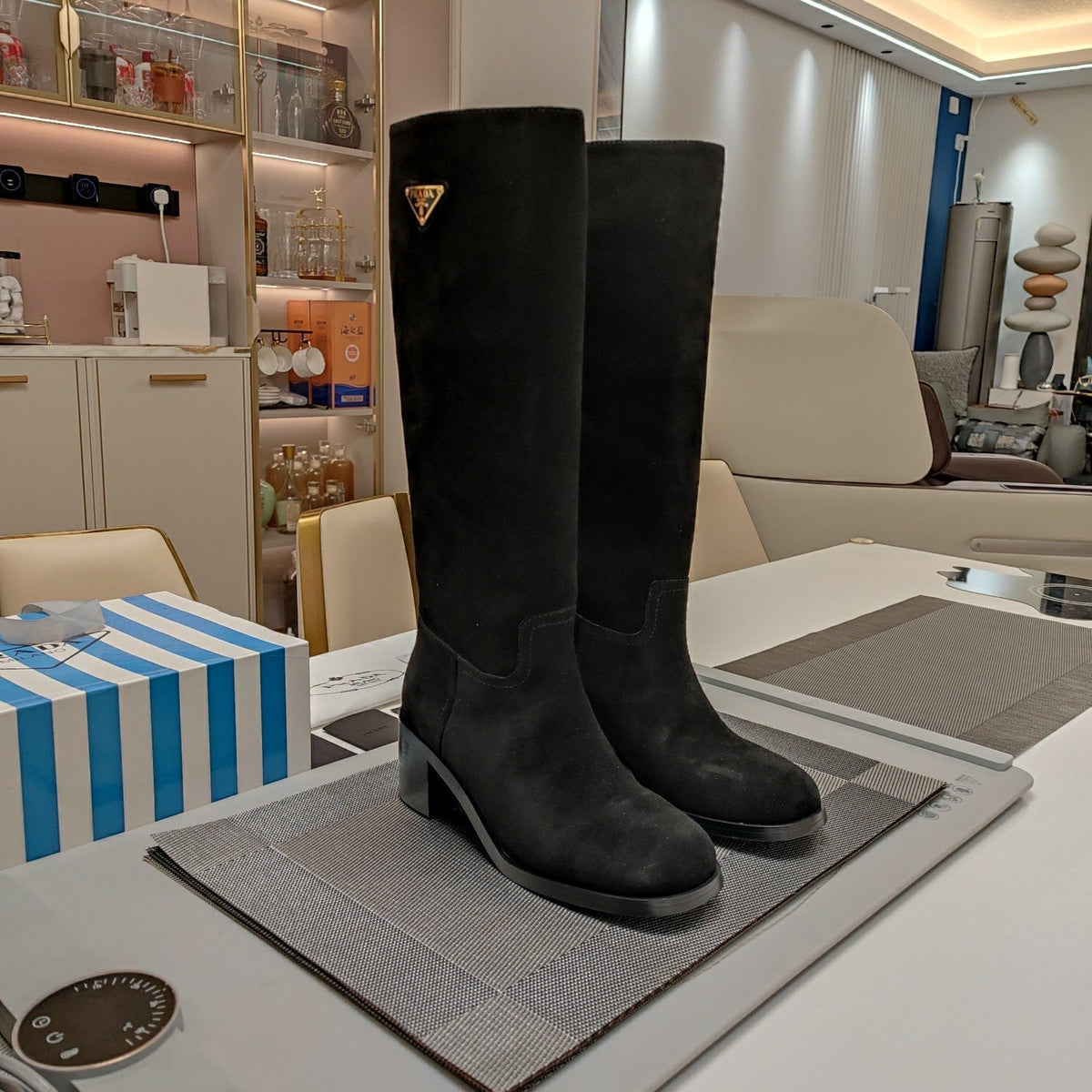 PRADA KNEE BOOTS WITH TRIANGLE LOGO IN BLACK SUEDE