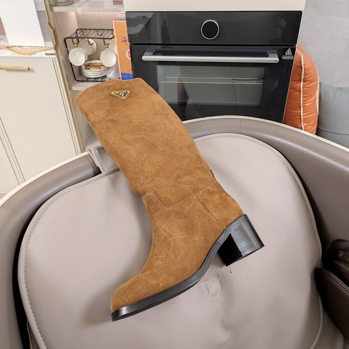 PRADA KNEE BOOTS WITH TRIANGLE LOGO IN CAMEL SUEDE
