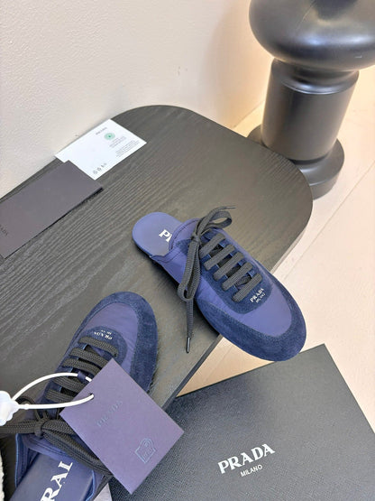 PRADA SNEAKER MULES IN NAVY BLUE NYLON AND SUEDE