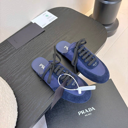 PRADA SNEAKER MULES IN NAVY BLUE NYLON AND SUEDE