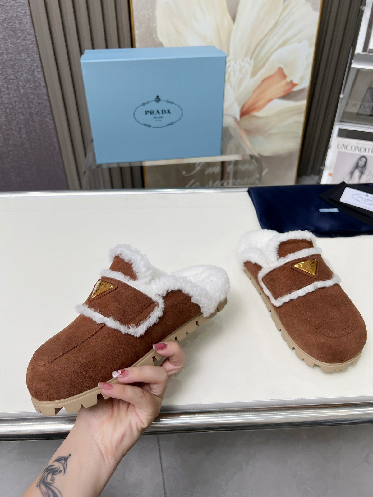 PRADA SUEDE AND SHEARLING MULES UMBER BROWN