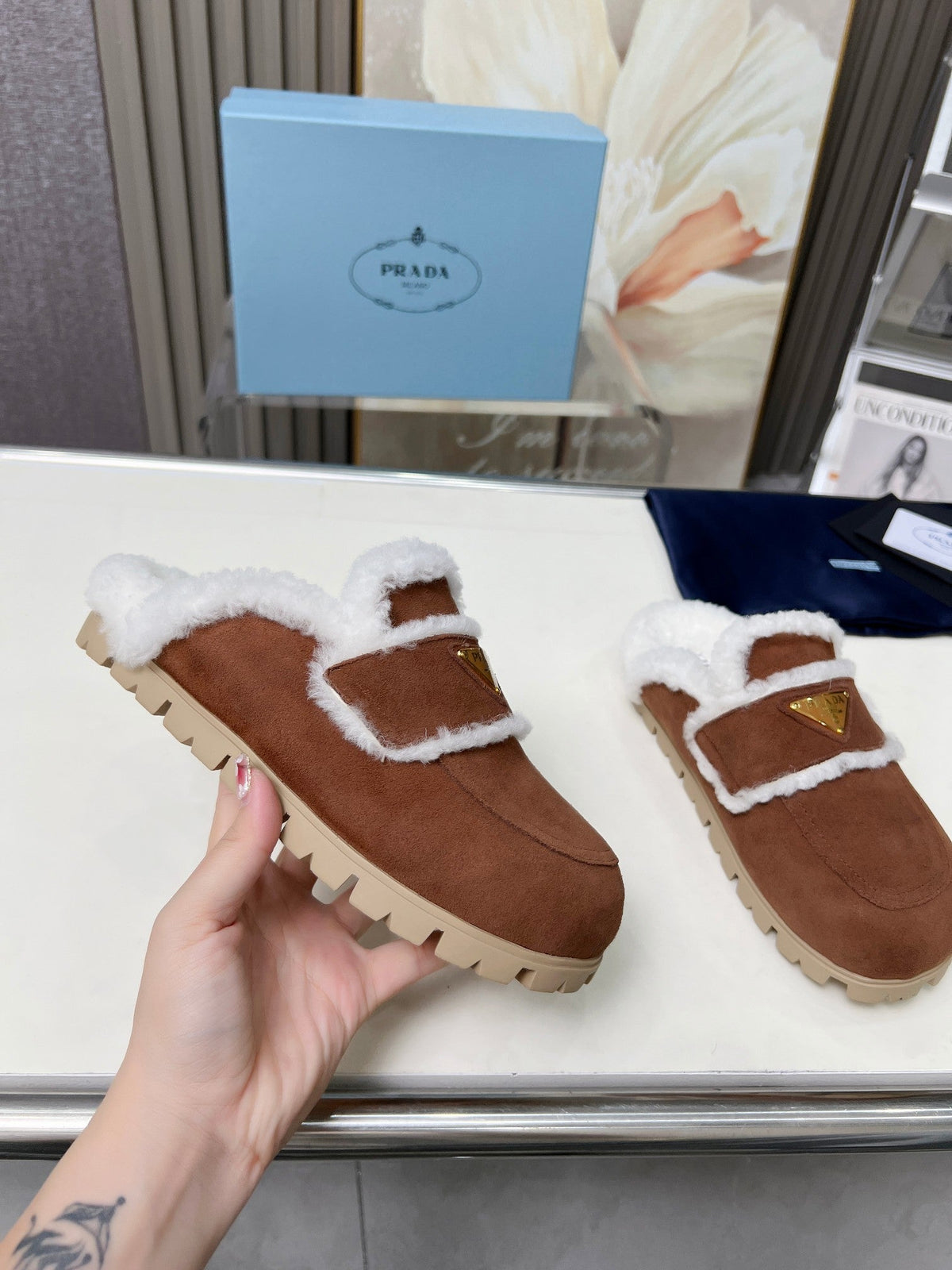 PRADA SUEDE AND SHEARLING MULES UMBER BROWN