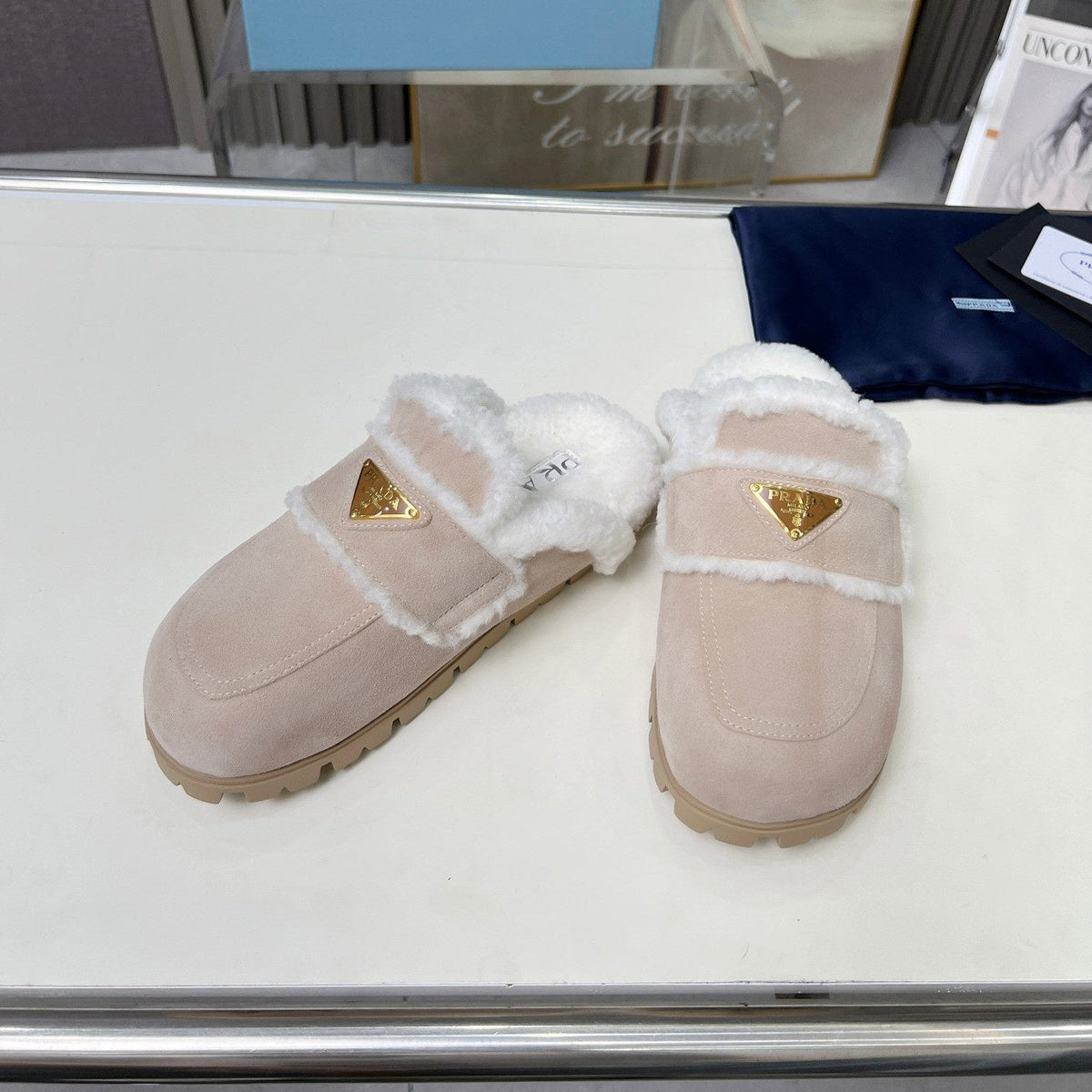 PRADA SUEDE AND SHEARLING MULES BEIGE