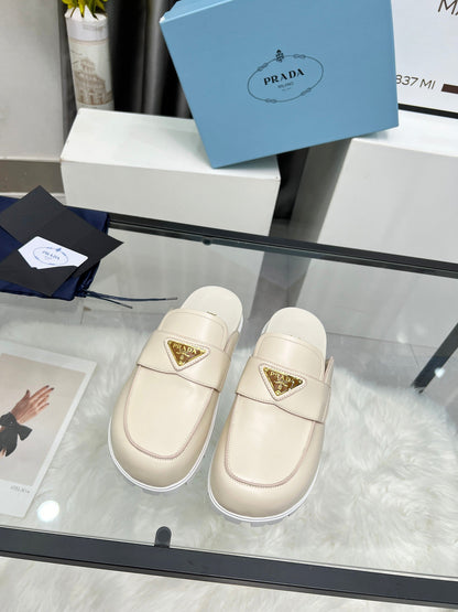 PRADA SABOTS MULES BEIGE CALFSKIN