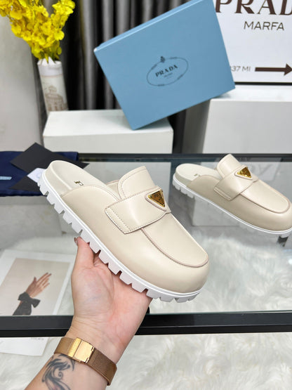 PRADA SABOTS MULES BEIGE CALFSKIN