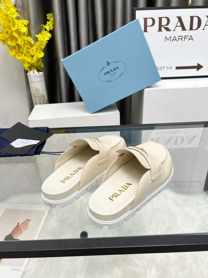 PRADA SABOTS MULES BEIGE CALFSKIN