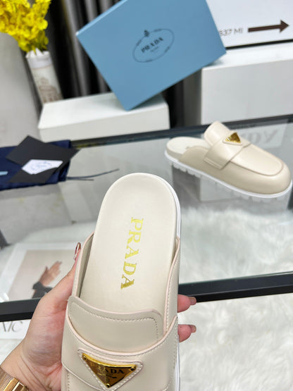 PRADA SABOTS MULES BEIGE CALFSKIN