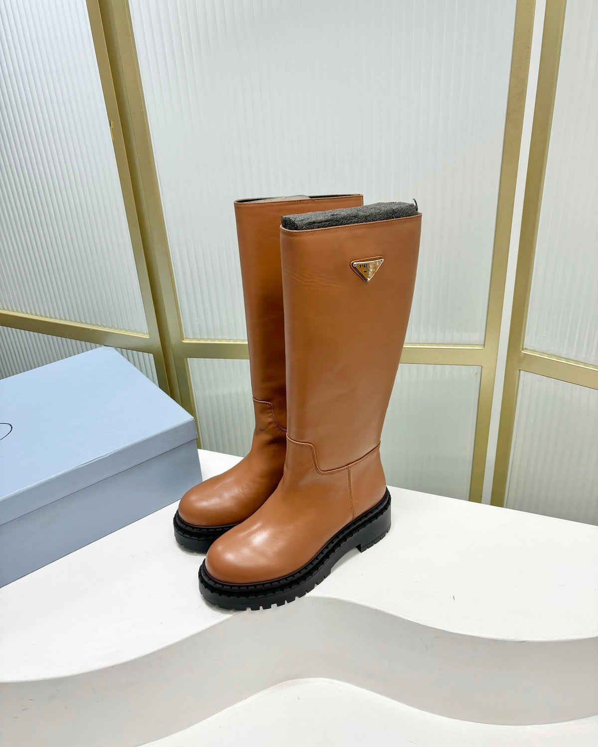 PRADA KNEE BOOTS WITH TRIANGLE LOGO IN CAMEL CALFSKIN