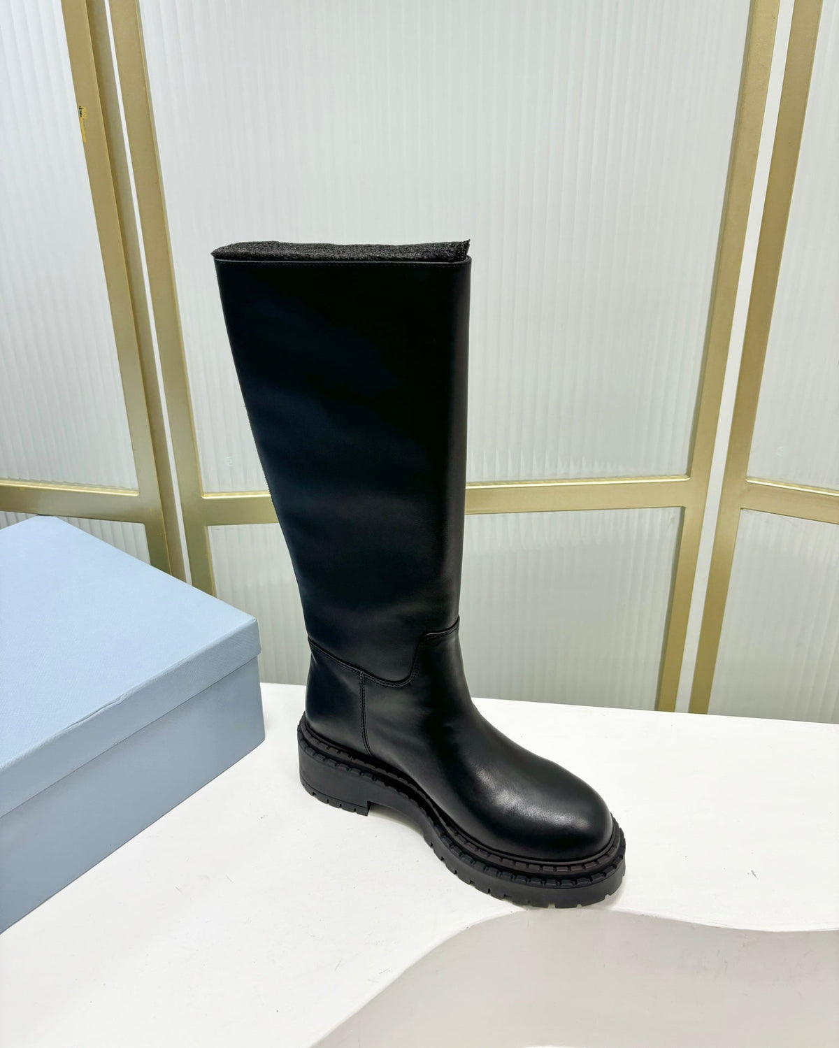 PRADA KNEE BOOTS WITH TRIANGLE LOGO IN BLACK CALFSKIN