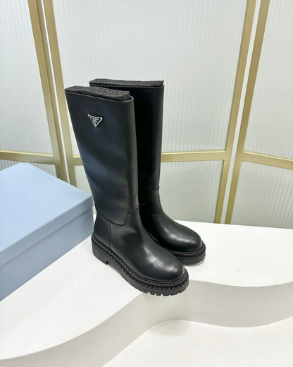 PRADA KNEE BOOTS WITH TRIANGLE LOGO IN BLACK CALFSKIN