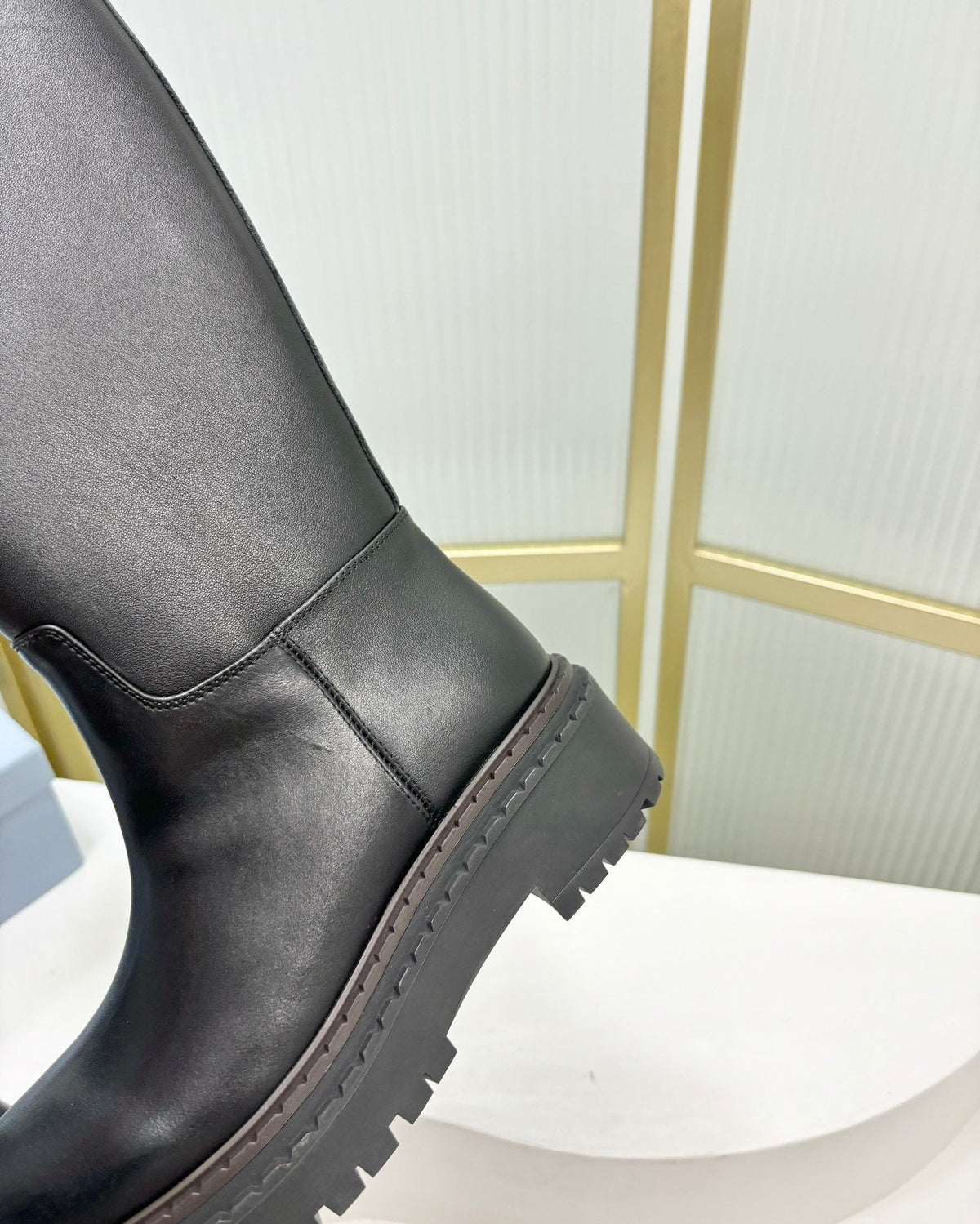 PRADA KNEE BOOTS WITH TRIANGLE LOGO IN BLACK CALFSKIN