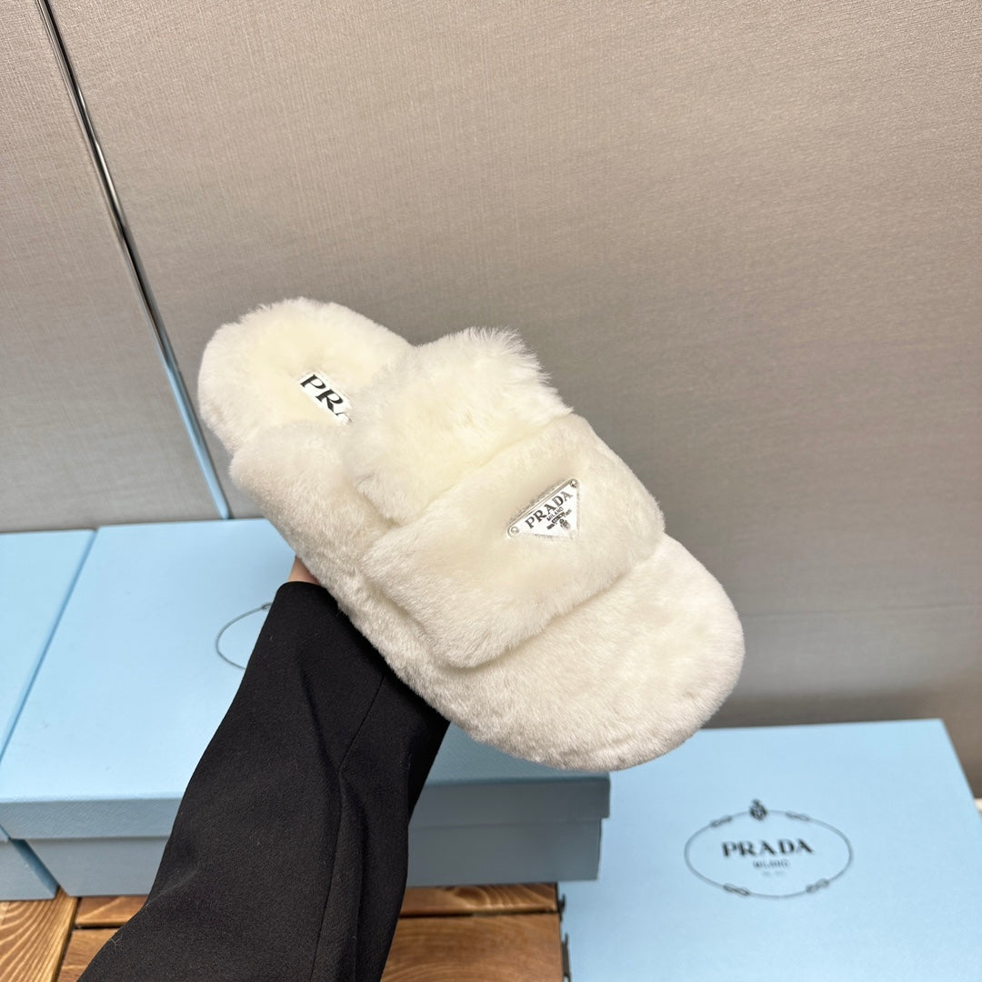 PRADA FLAT MULES IN WHITE RABBIT FUR