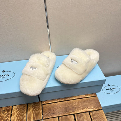PRADA FLAT MULES IN WHITE RABBIT FUR