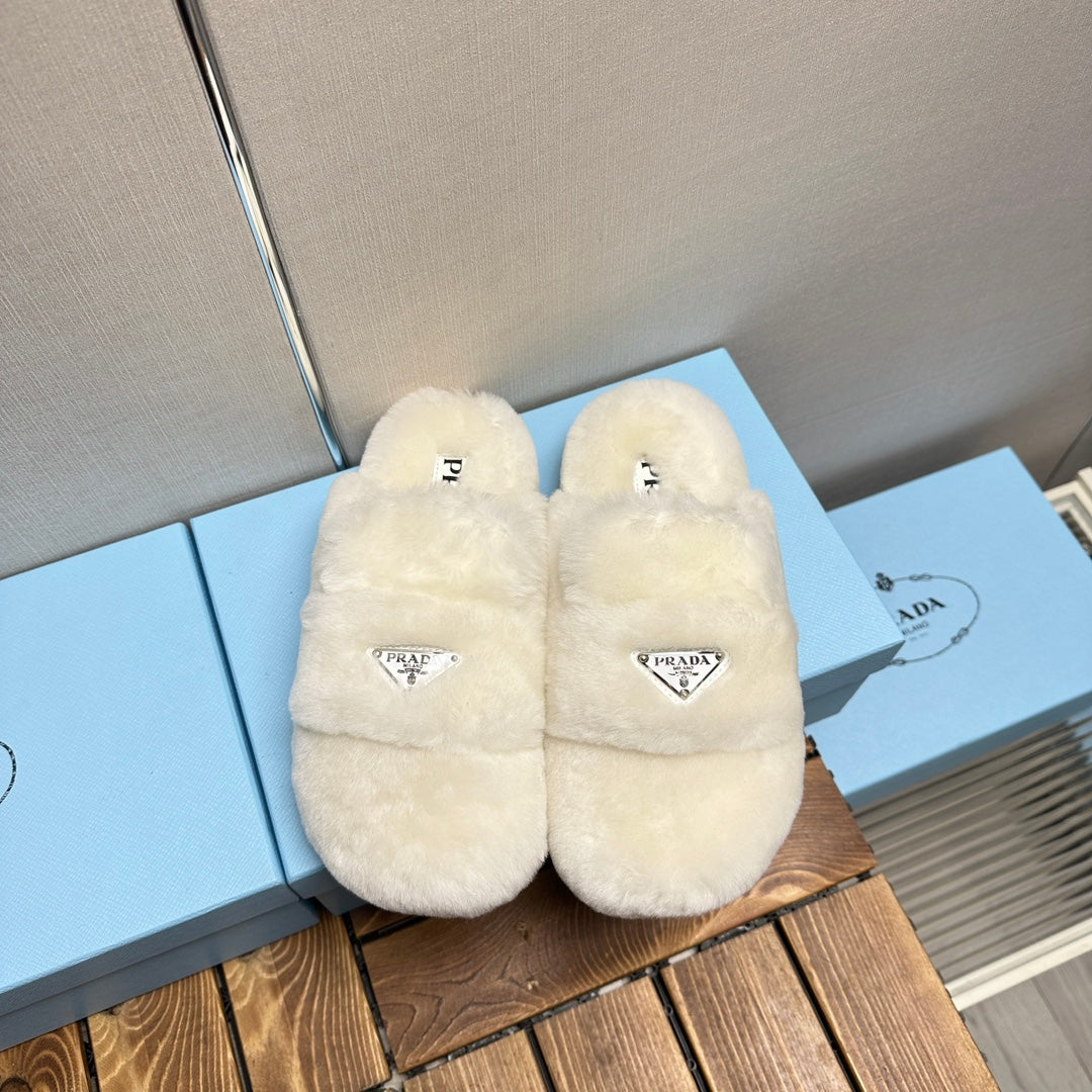 PRADA FLAT MULES IN WHITE RABBIT FUR