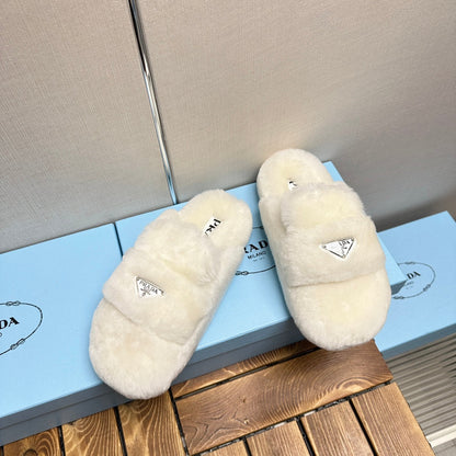 PRADA FLAT MULES IN WHITE RABBIT FUR