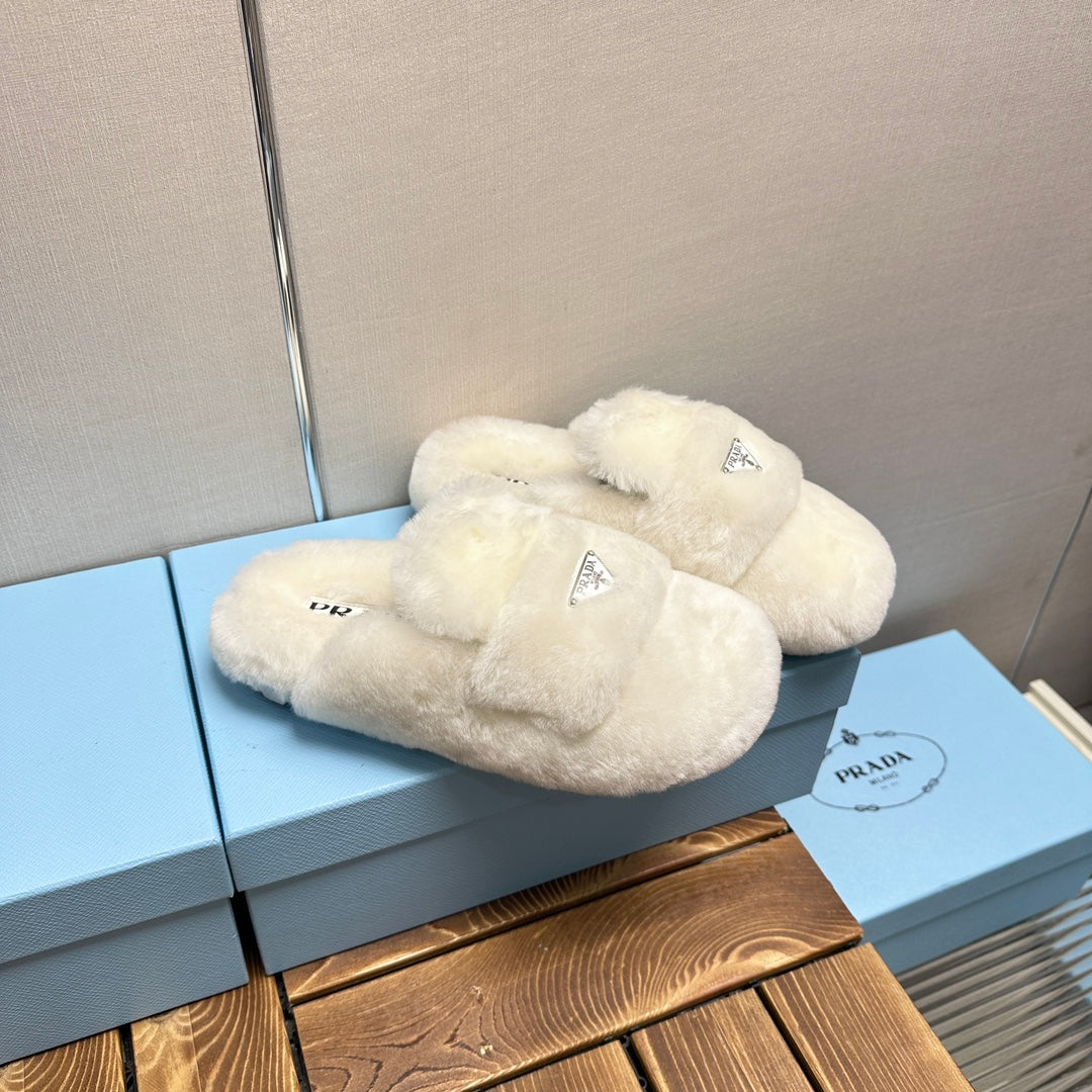 PRADA FLAT MULES IN WHITE RABBIT FUR