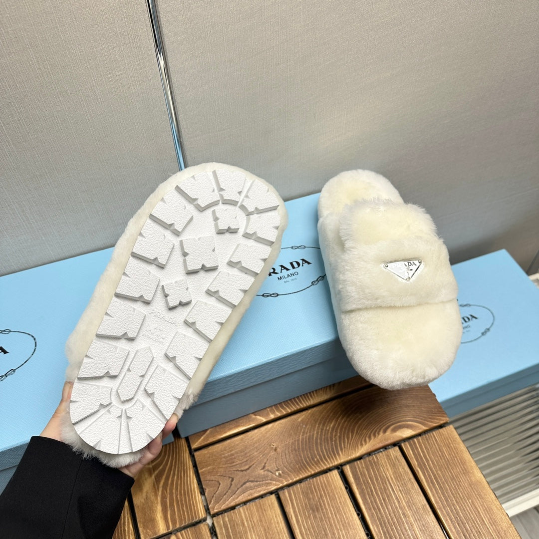 PRADA FLAT MULES IN WHITE RABBIT FUR