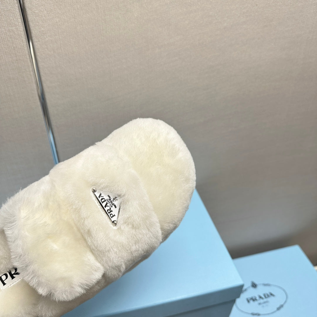 PRADA FLAT MULES IN WHITE RABBIT FUR