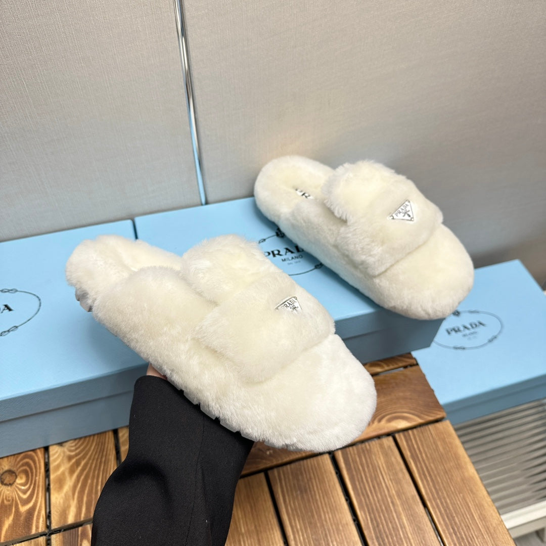 PRADA FLAT MULES IN WHITE RABBIT FUR