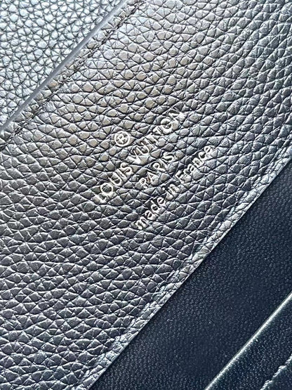 LOUIS VUITTON CAPUCINES EAST-WEST 27 IN BLACK TAURILLON