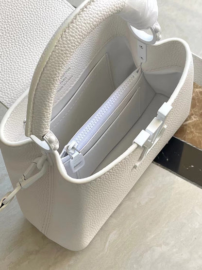 LOUIS VUITTON CAPUCINES EAST-WEST MINI 21 IN WHITE TAURILLON