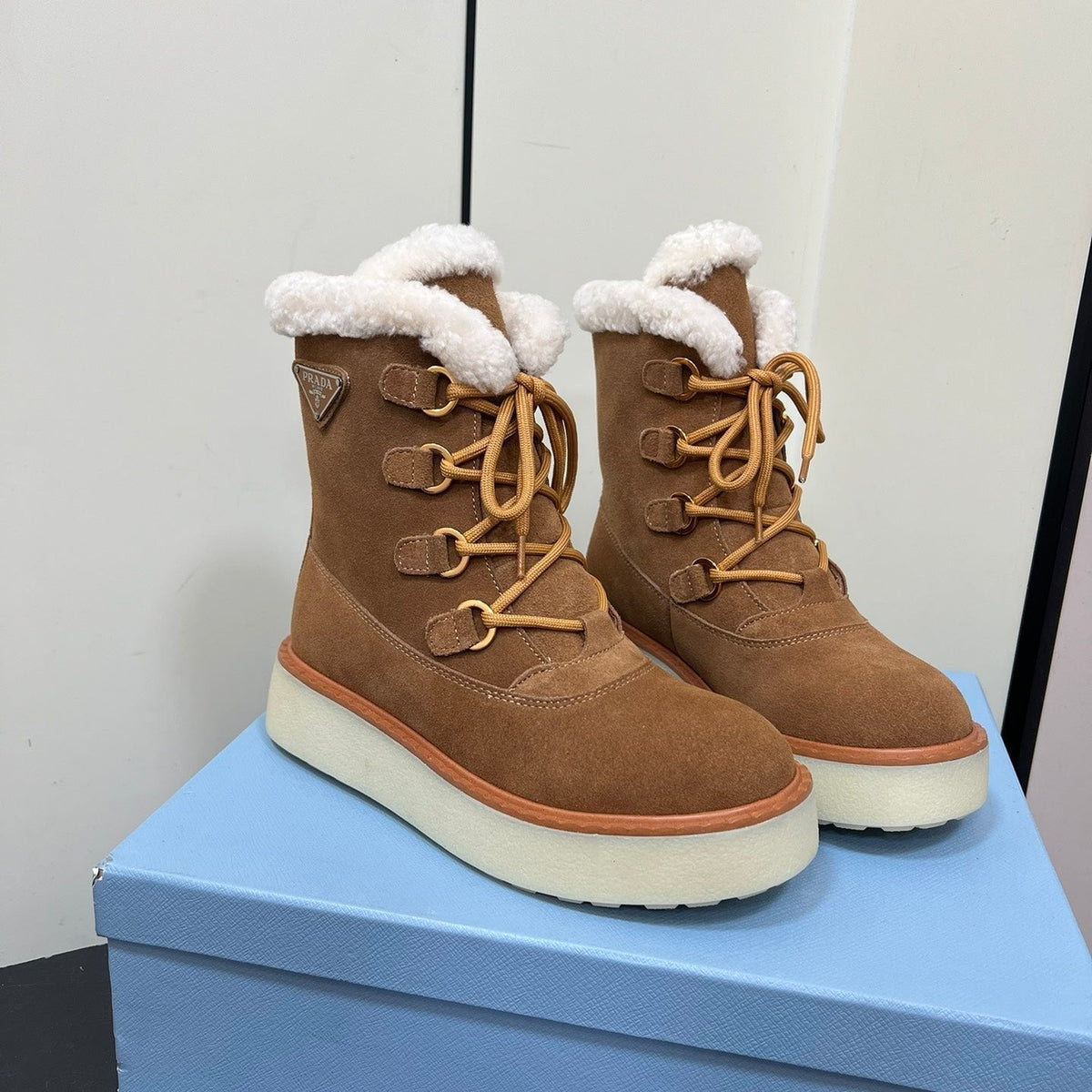 PRADA LACE-UP ANKLE BOOTS IN CAMEL SUEDE AND SHEARLING LINING