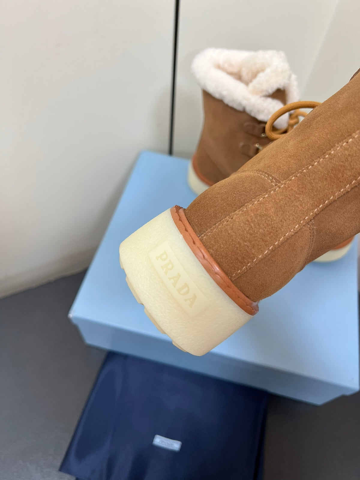 PRADA LACE-UP ANKLE BOOTS IN CAMEL SUEDE AND SHEARLING LINING