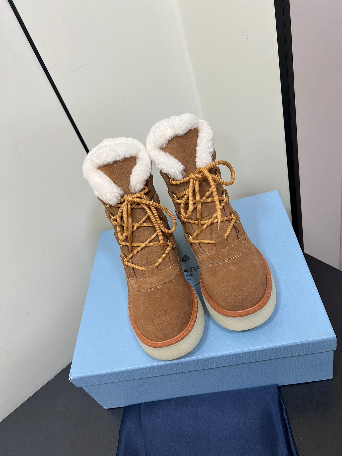 PRADA LACE-UP ANKLE BOOTS IN CAMEL SUEDE AND SHEARLING LINING