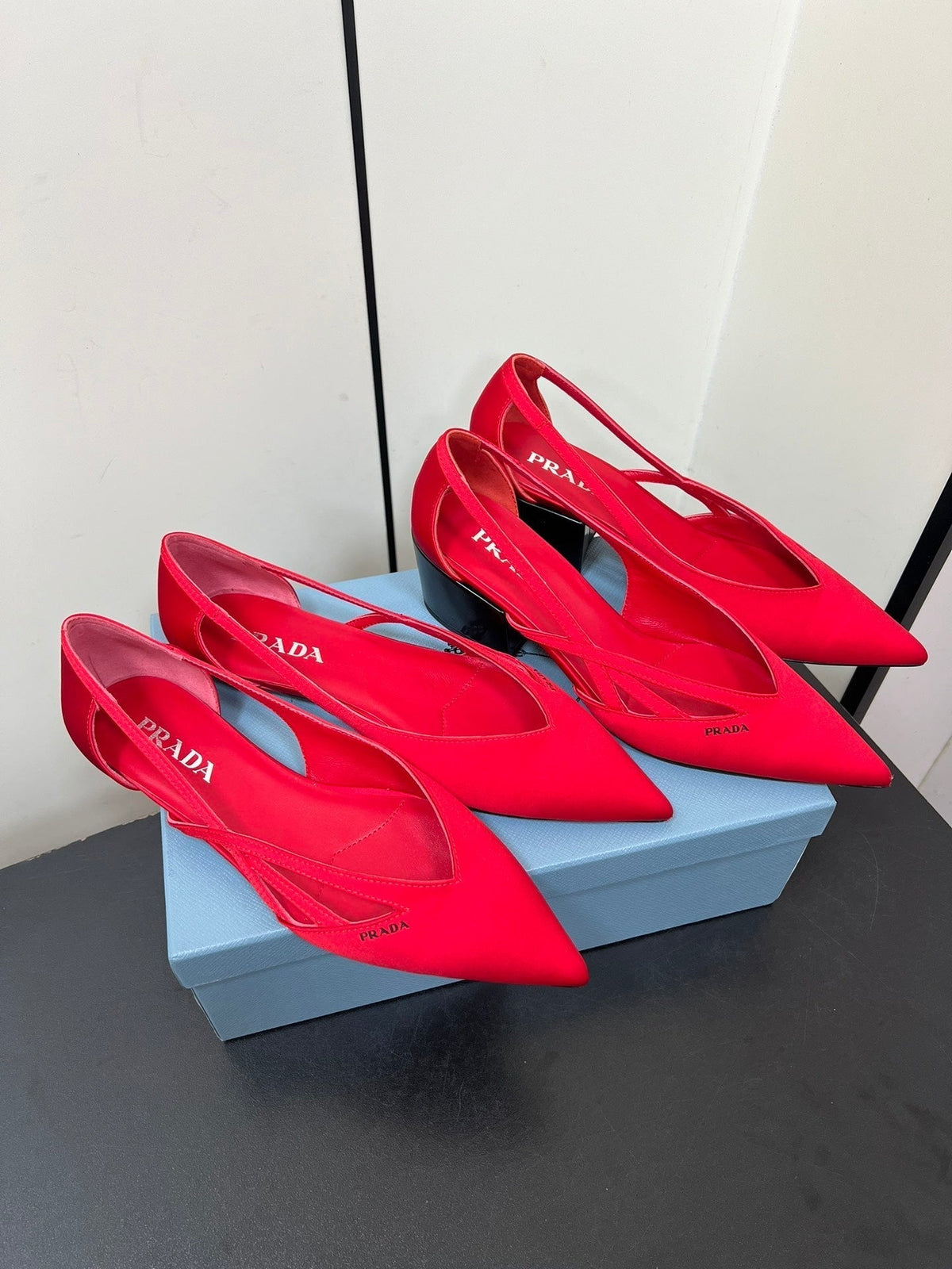 PRADA CUT-OUT BALLERINAS IN RED SATIN