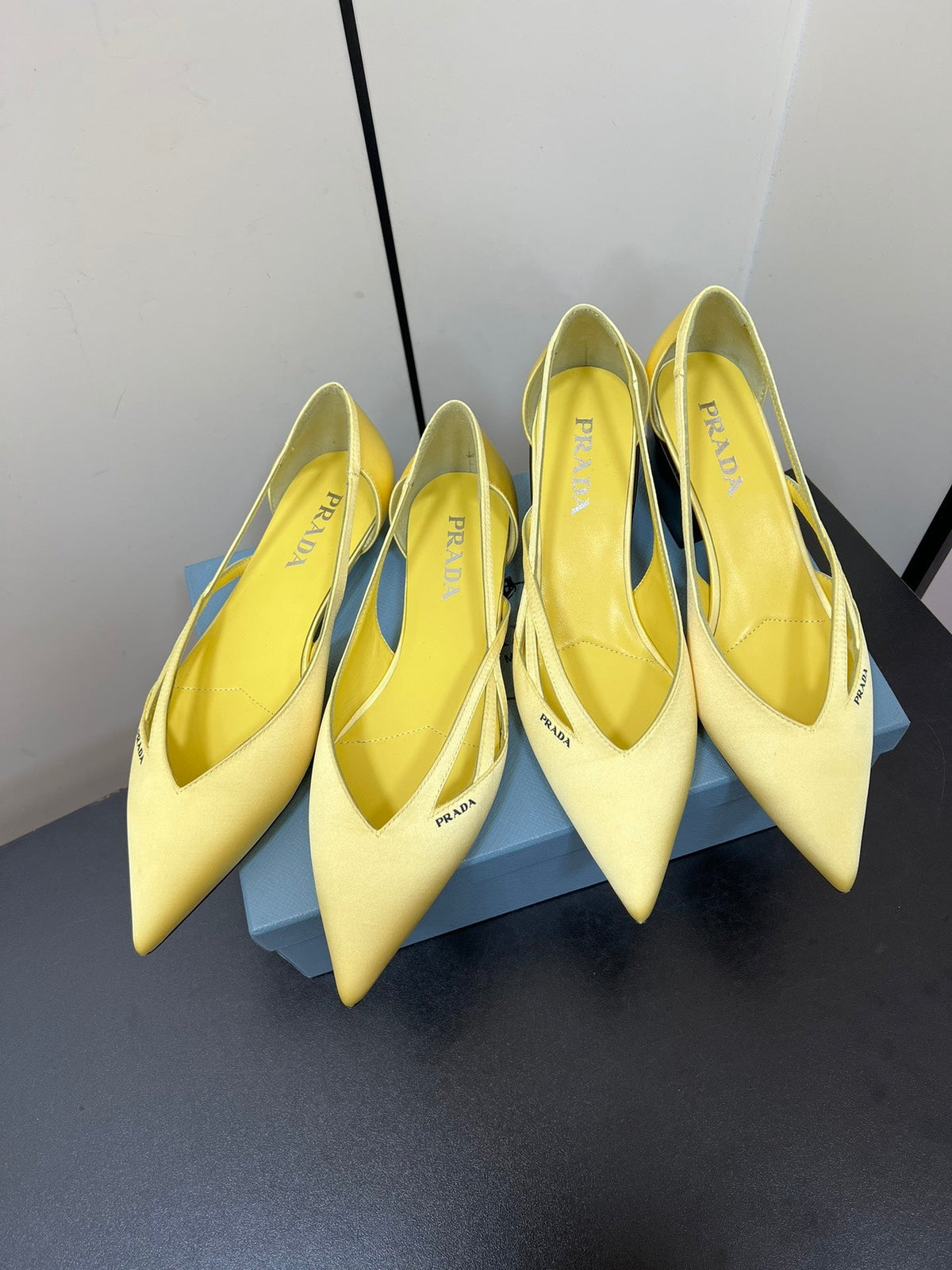 PRADA CUT-OUT BALLERINAS IN LIGHT YELLOW SATIN