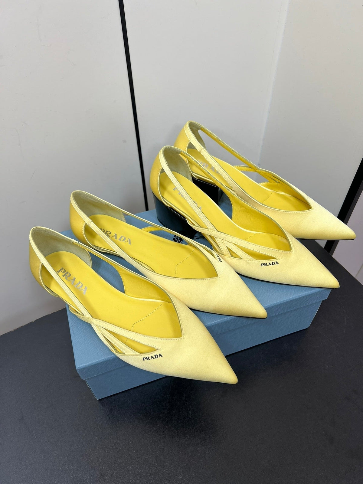 PRADA CUT-OUT BALLERINAS IN LIGHT YELLOW SATIN