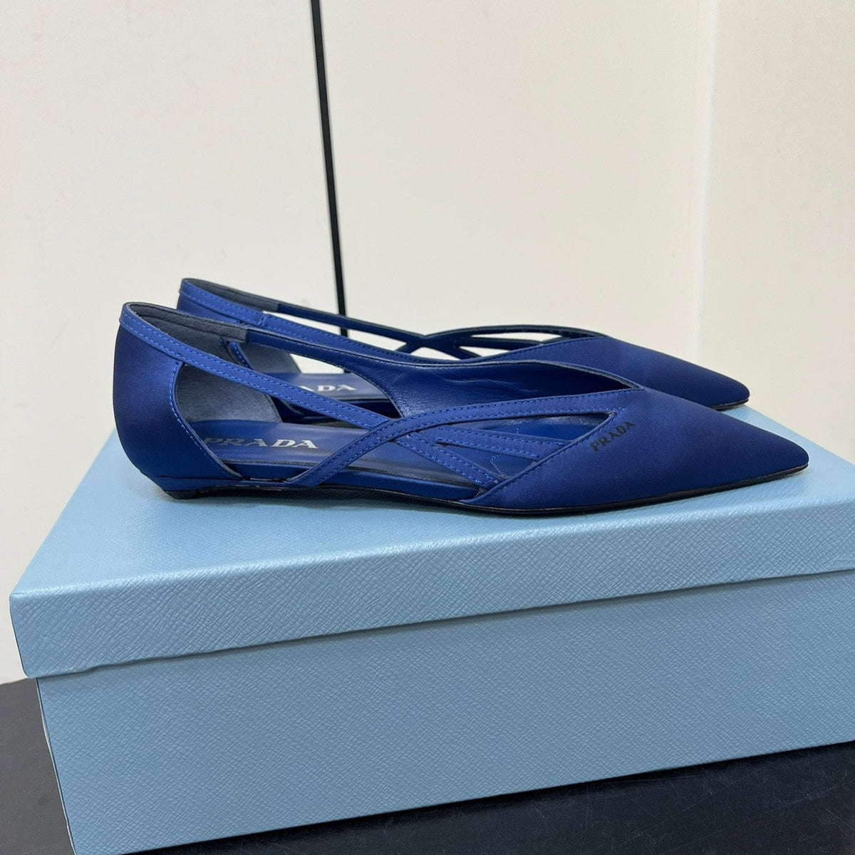 PRADA CUT-OUT BALLERINAS IN NAVY BLUE SATIN