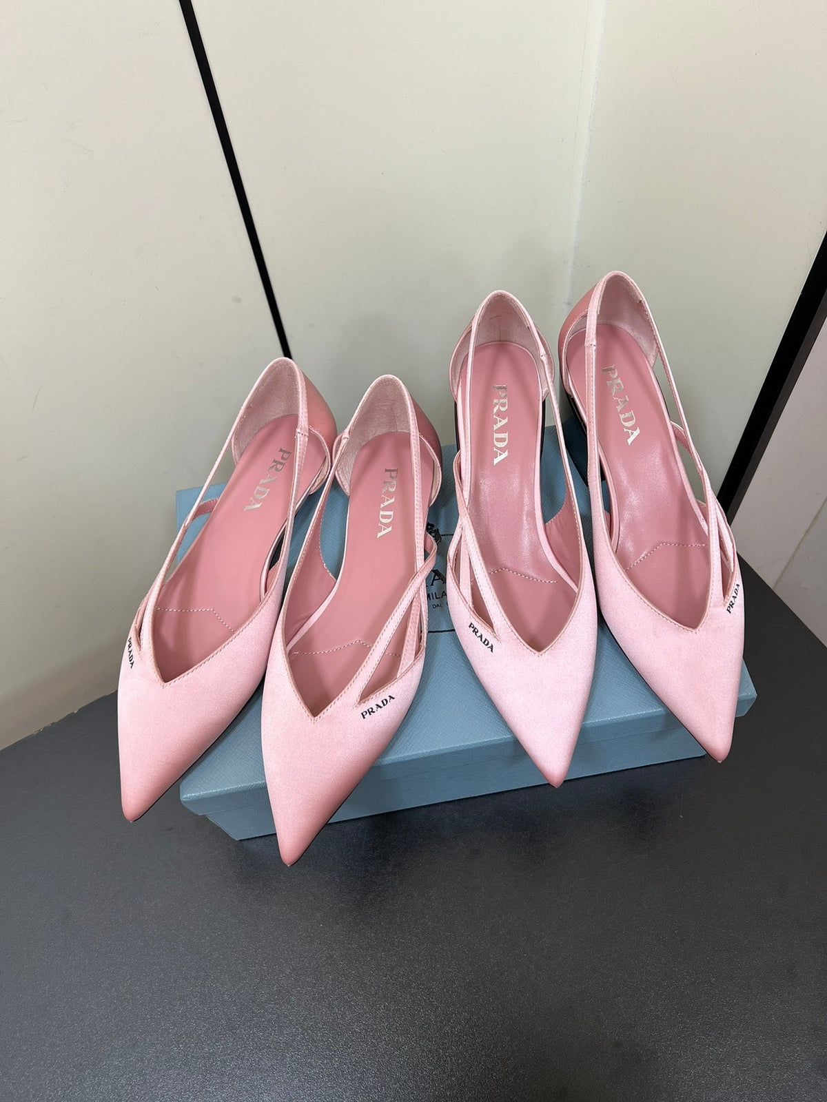 PRADA CUT-OUT BALLERINAS IN BABY PINK SATIN