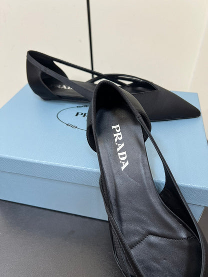 PRADA CUT-OUT BALLERINAS IN BLACK SATIN