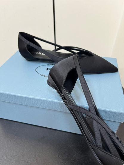 PRADA CUT-OUT BALLERINAS IN BLACK SATIN