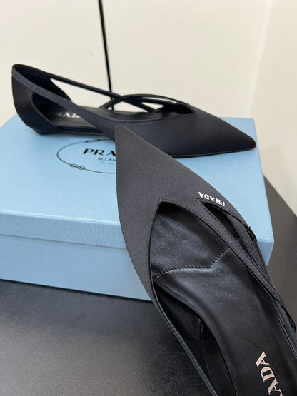 PRADA CUT-OUT BALLERINAS IN BLACK SATIN