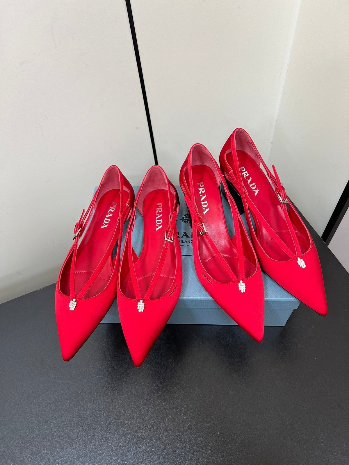 PRADA CUT-OUT BALLERINA FLAT IN CLASSIC RED SATIN ATTACHED BEAD BUCKLE