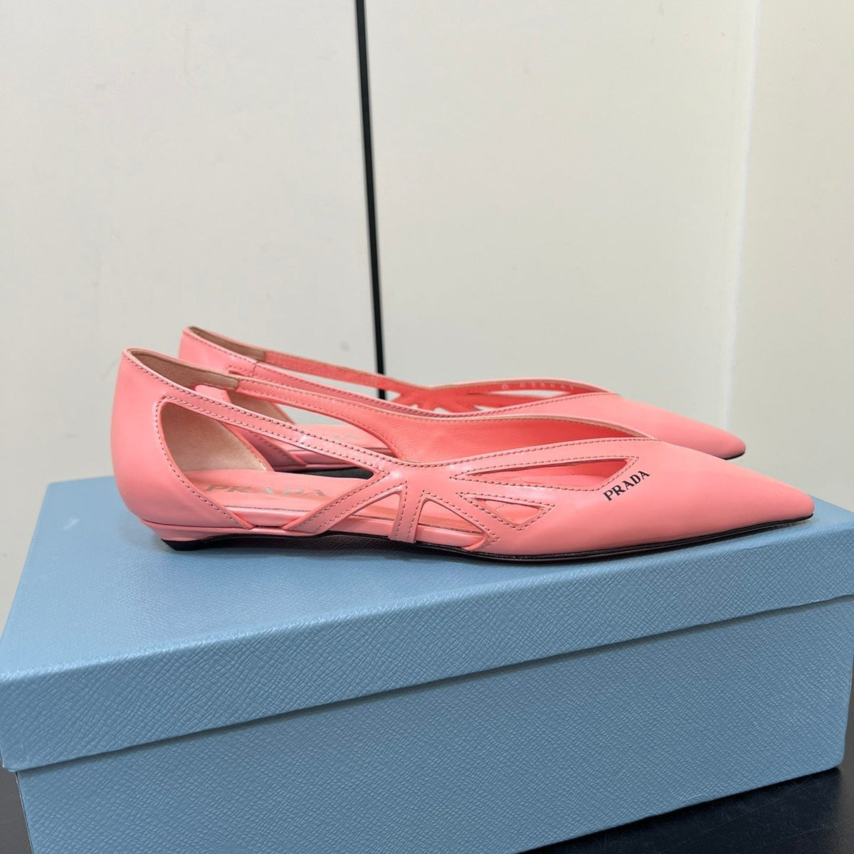 PRADA BRUSHED CUT-OUT BALLERINA FLAT IN SALMON PINK CALFSKIN