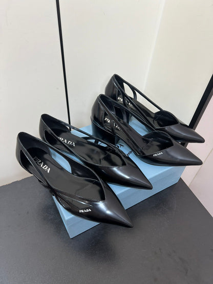 PRADA BRUSHED CUT-OUT BALLERINA FLAT IN BLACK CALFSKIN