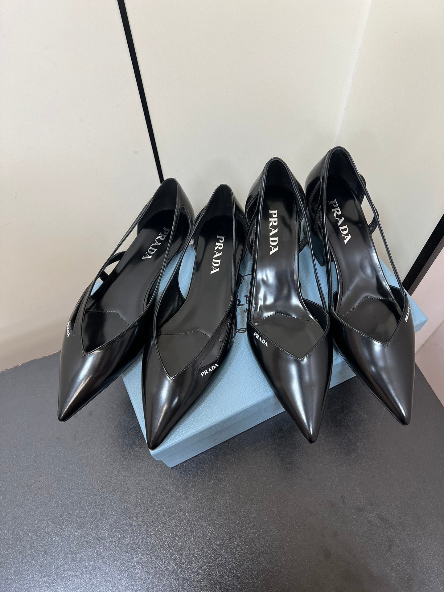 PRADA BRUSHED CUT-OUT BALLERINA FLAT IN BLACK CALFSKIN