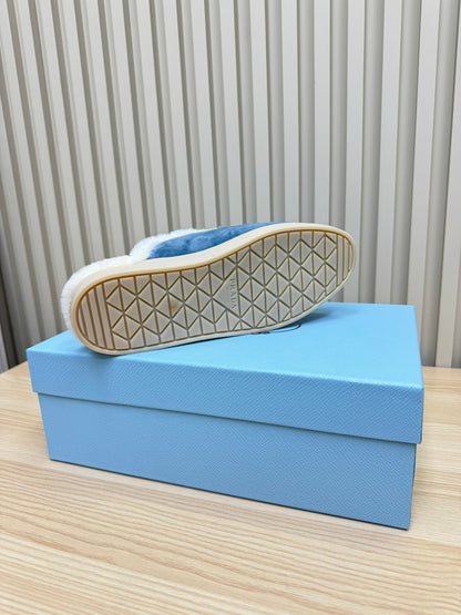 PRADA TRIANGLE LOGO FLATS IN AZURE BLUE SUEDE AND FUR LINING