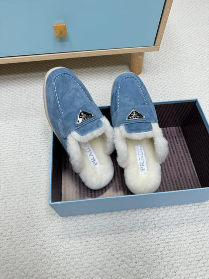 PRADA TRIANGLE LOGO FLATS IN AZURE BLUE SUEDE AND FUR LINING