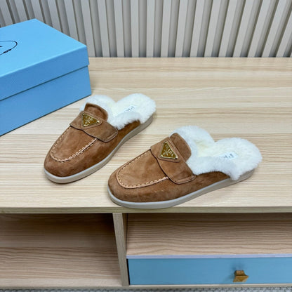 PRADA TRIANGLE LOGO FLATS IN CAMEL SUEDE AND FUR LINING