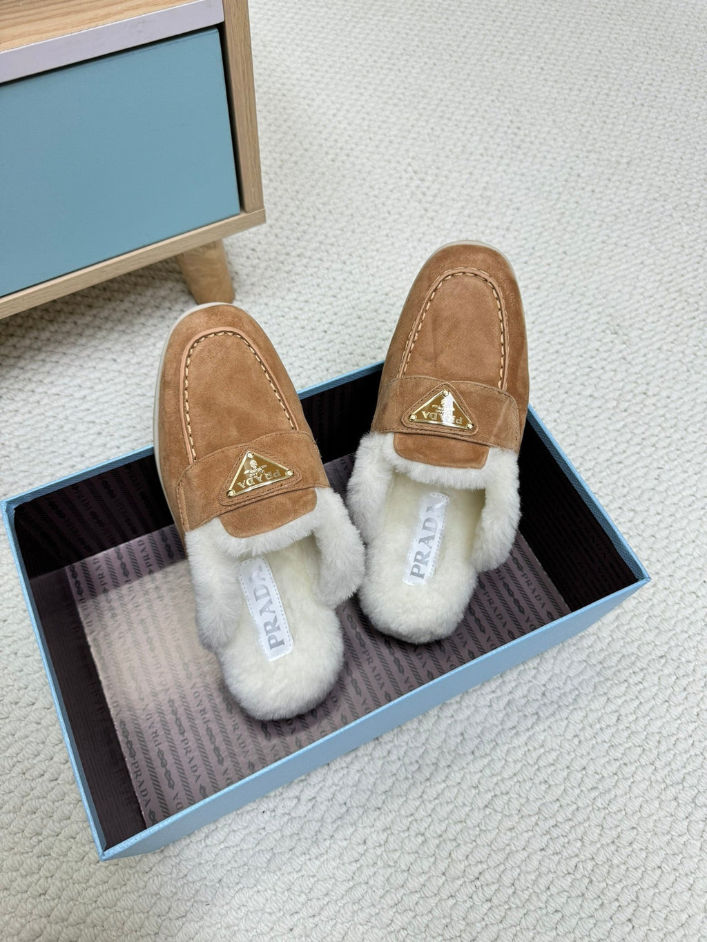 PRADA TRIANGLE LOGO FLATS IN CAMEL SUEDE AND FUR LINING